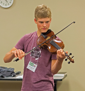 young man playing fiddle
