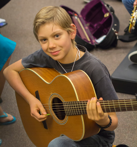 young man with guitar