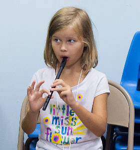 Gillian Hunter playing whistle