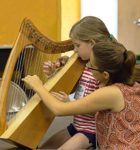 Heather Scroggin helping Maura Palmer_edited