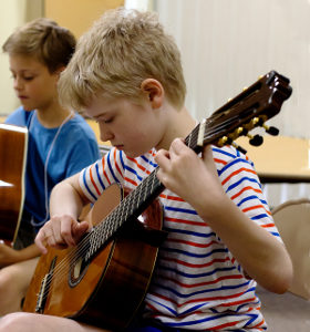 Linden Meyer playing guitar_edited